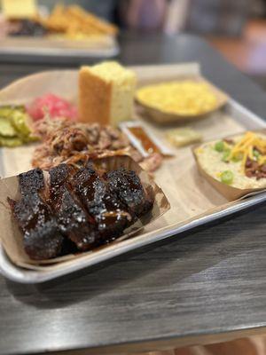 Burnt Ends, pulled pork, loaded grits, Mac and cheese.