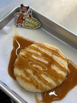 Sugar cookie with hot caramel drizzle