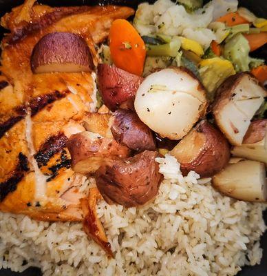 Salmon, potatoes, broccoli,  and brown rice