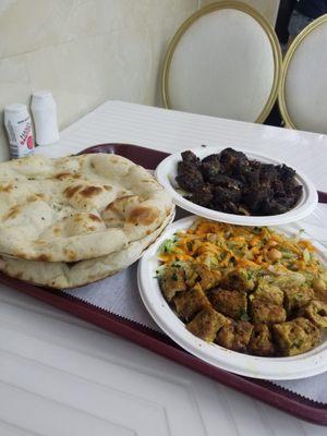 Fried beef with chicken kabobs and naan