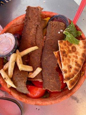 Greek salad with gyro meat ( you can't finish this bad boy in one go). Ignore the fries stolen off of my plate!