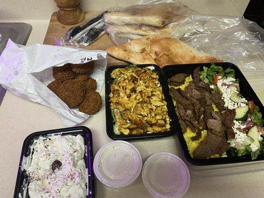 Ton of pita, gyro plate, chicken swarma salad, falafel and labneh