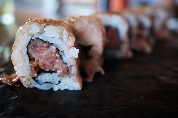 "LBD" - seared wagyu on a wagyu and takuan roll