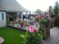 Summer on the deck is a fun time surrounded by beauty.