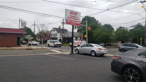 Outdoor sign & parking lot .