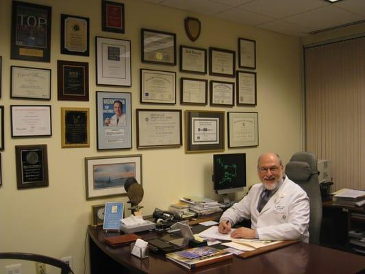 Dr. Simon and his "Wall of Fame"