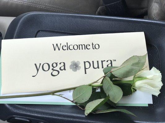 A rose from the owner and some welcome information about the studio for my first free Mother's Day class at Yoga Pura!