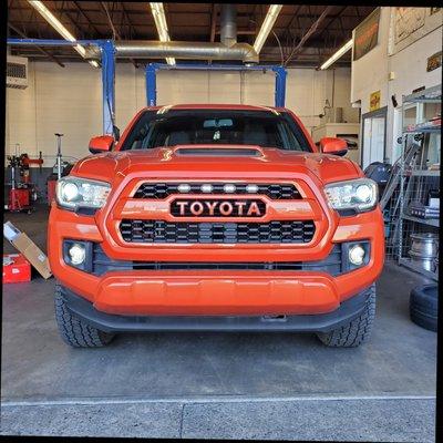 tacoma with raptor lights and grille