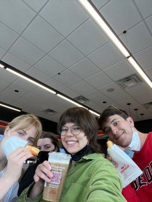 dunkin customers enjoying their coffee