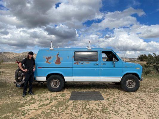 My husband and our E350 Ford Econoline with a 7.3 International Harvester Diesel Engine