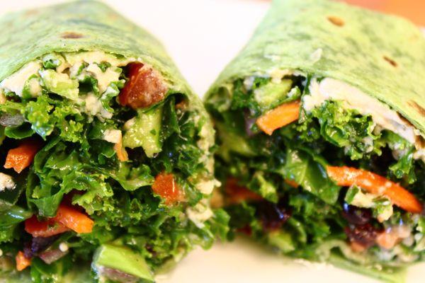 Kale Wrap- Fresh Kale, Red onion, Carrots, Craisins, Jalapeno, Cucumbers, Hummus, House made dressing