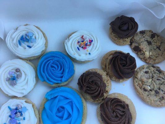 Iced sugar cookies, chocolate peanut butter thumbprints and "everything" cookies.