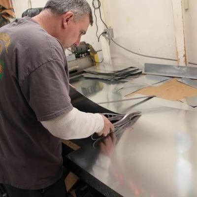 Davis & Davis has its own large sheet metal fabrication shop. We design and install all our metal products.