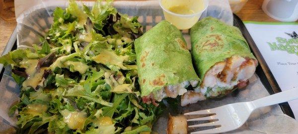 Chicken Wrap and side greens and dressing...