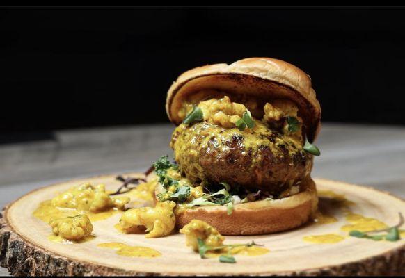 surf n turf -
lamb burger with golden lobster cream sauce