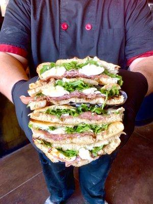 Prosciutto Sando - Creamy Brie, Fig Jam, Prosciutto, Arugula, Fresh Mozzarella