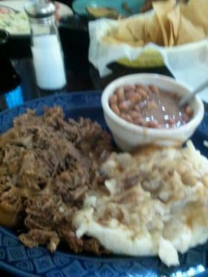 Roast Beef Plate with mashed tators and red beans.