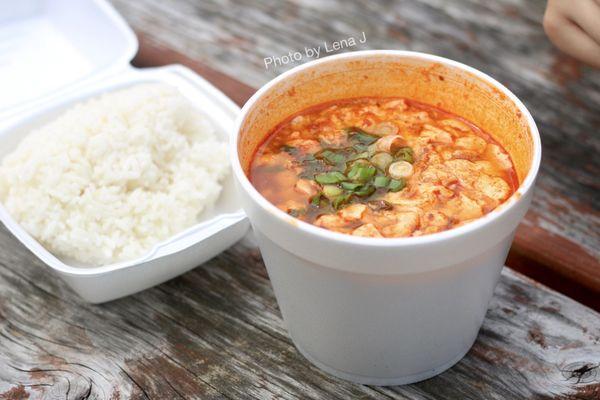 Takeout Soon Dooboo  ($11.35) - Spicy tofu stew with seafood and beef, requested extra spicy. Comes with an egg