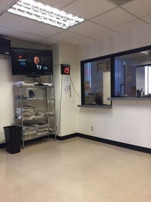 Front desk and TV for waiting area