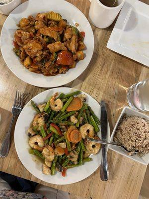 Sweet and sour pork with jasmine rice and shrimp and asparagus stir fry with brown rice