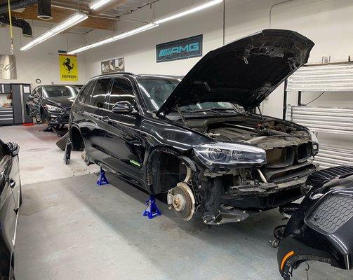 BMW X6 getting prepped for vehicle wrap and ceramic pro coating