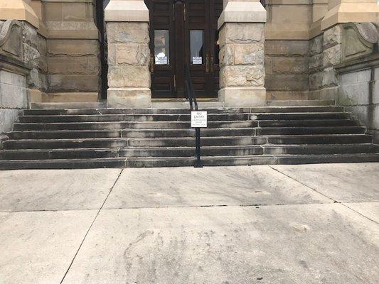 Before we soft washed a courthouse--black algae.