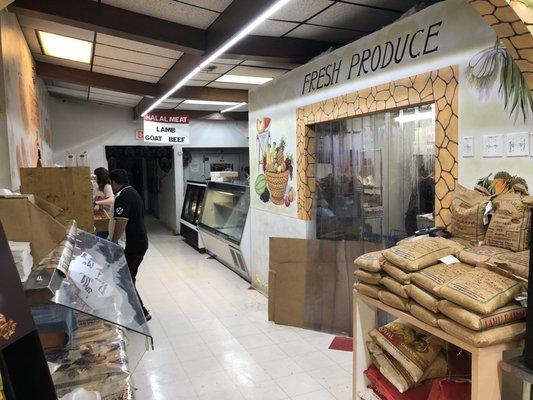 The produce and butcher shop, to the left is the bakery.