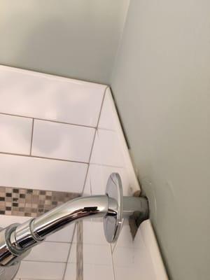 Missed improperly sealed tiles and fixtures in bathroom.