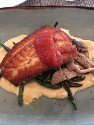 Pan-seared flounder on garlic mashed potatoes with green beans and mushrooms