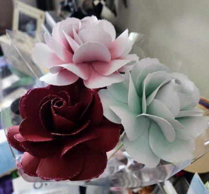 Paper roses made by non profit with a store there