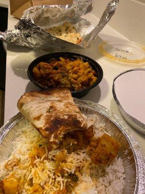 Garlic naan, Aloo Gobi (V) and plane rice