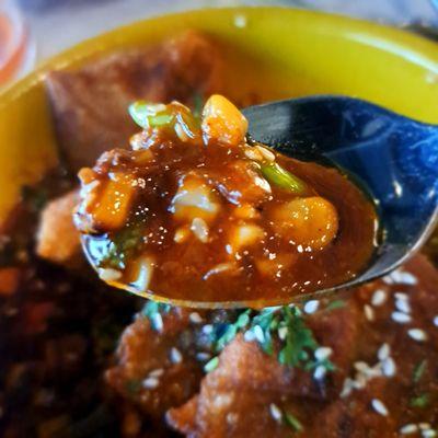 The delicious broth from the birria dumplings