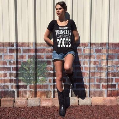 Amra wearing Melinda Frayed Shorts by P4:13 Denim, Corral Boots, and "This princess wears boots" Tee