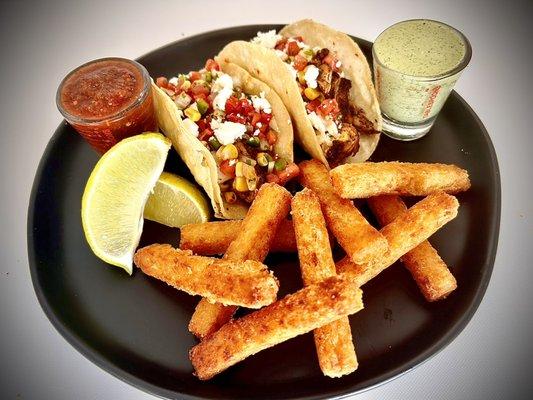 Blackened chicken tacos with yuca fries