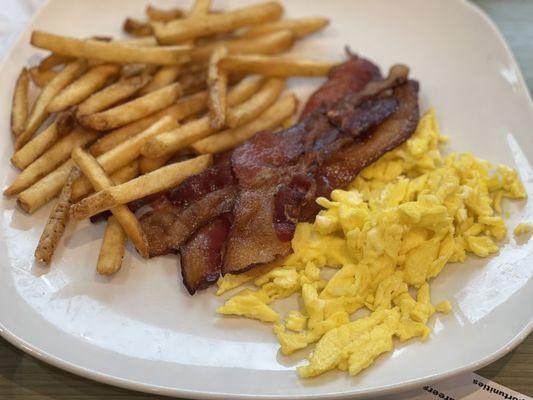 Kids scrambled egg with bacon and fries