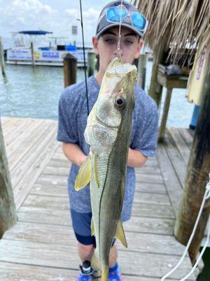 My nephew with the snook he nabbed!