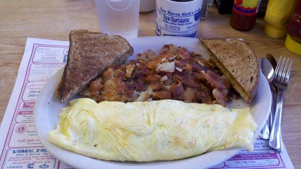 The Spinach Omelet with bacon (à la Laura), American fries, rye toast, and coffee