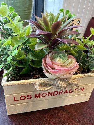 Table decorations with the word losMondragon.  .