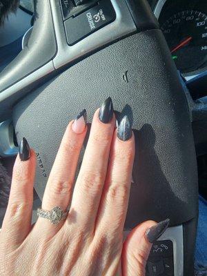 Short stiletto nails.