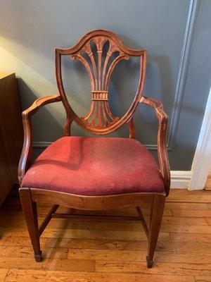 Dining chair "Before."  (Notice the piece of wood missing on the armrest).