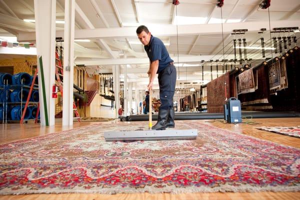 We clean rugs in our rug cleaning warehouse.