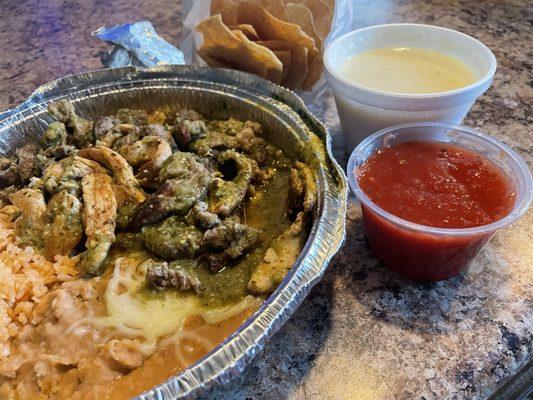 DoorDash Chile Verde.  Their version is beef and chicken.  Precut fajita meat.  Green nor red salsa had any merit.  Cheese dip sux