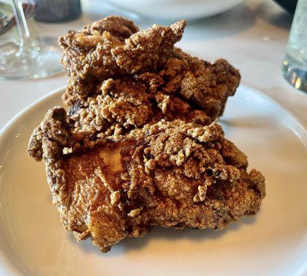 One of three pieces of fried chicken