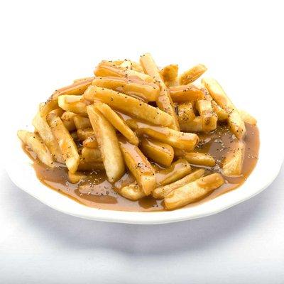 A plate of Genova's To Go gravy fries - a delicious combination of french fries with gravy and sauce. Yum!