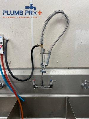 Commercial faucet installation.