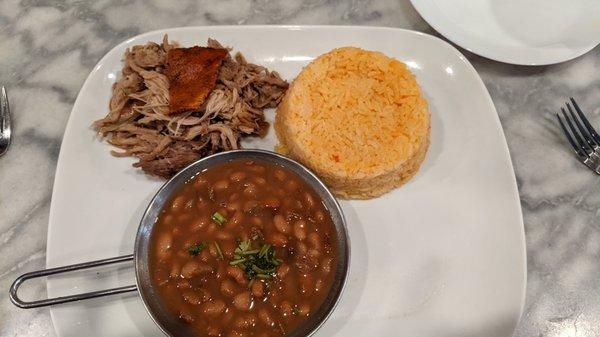 Pernil with red beans and yellow rice