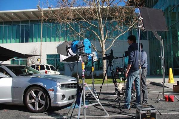 Filming corporate video shoot with Chevrolet Camaro