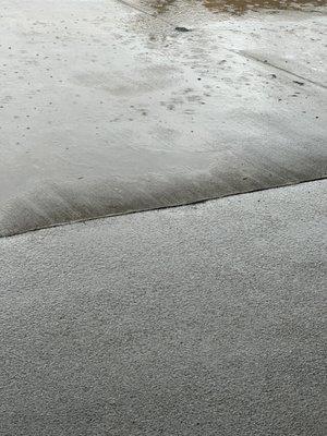 Water just before coming into back porch from deck they poured