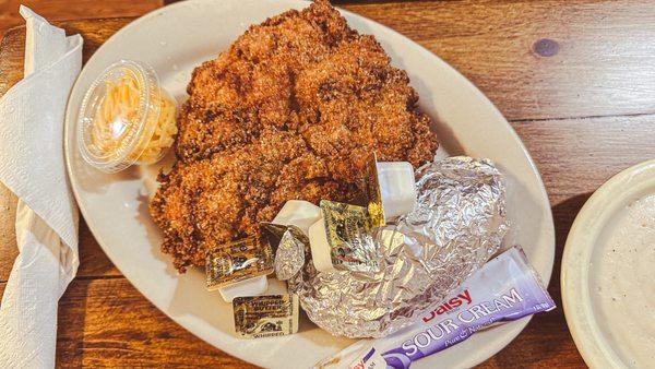 Chicken fried steak with baked potato