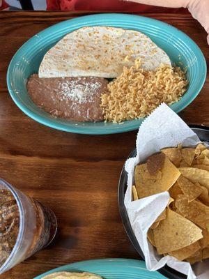 Quesadillas with beans and rice. You have to pay extra for the beans and rice?